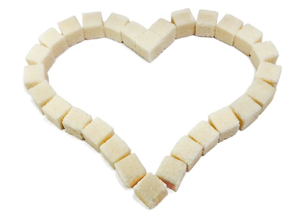 Serce z kromki białego rafinowanego cukru — Zdjęcie stockowe
