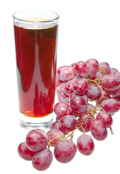 Clúster de uva y jugo en vidrio — Foto de Stock