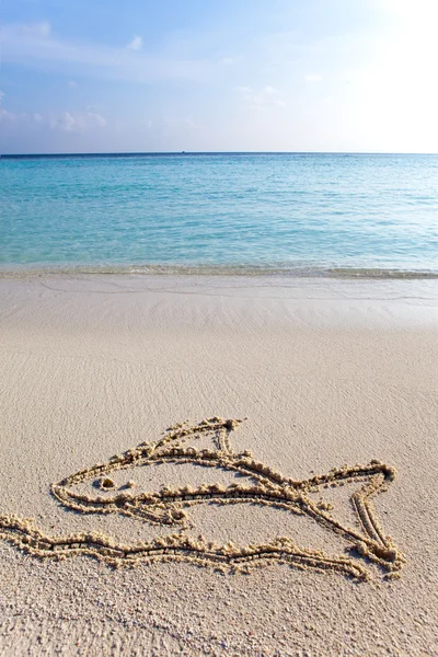 Dessin sur sable sur un thème de repos - poisson — Photo