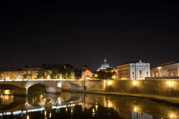 stock image Italy. Rome. Night. The bridge Vittorio Emmanuel through Tiber.