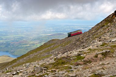 Steam Train heading to the Snowdon summit, Snowdonia, Wales clipart