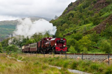 Steam train in Snowdonia, Wales clipart