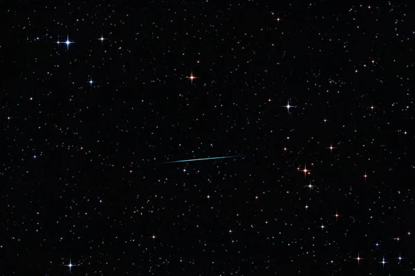 stock image Meteor crossing the starry sky