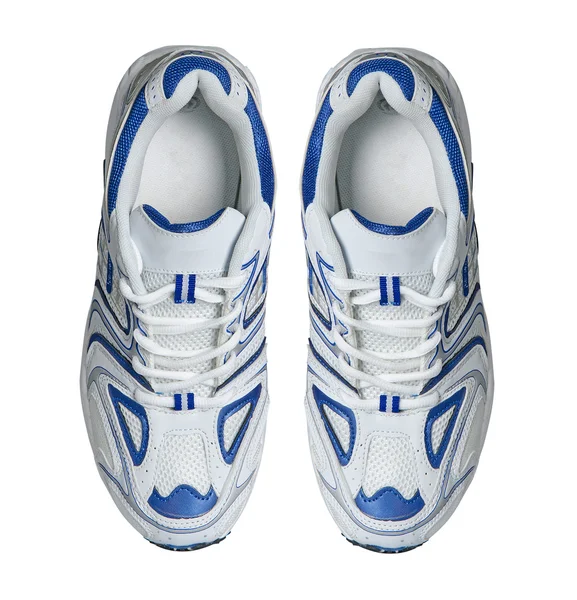 Beyaz arkaplanda izole edilmiş spor ayakkabılar — Stok fotoğraf
