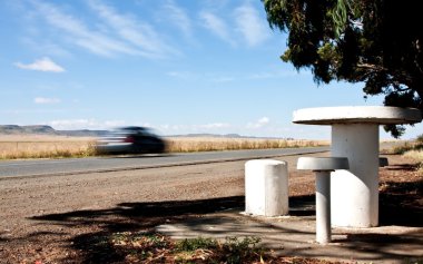 Road in the country side with picnic site clipart