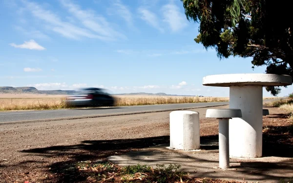 stock image Road in the country side with picnic site