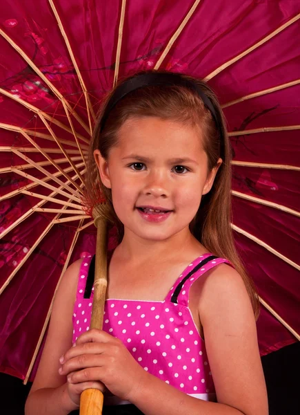 Small girl holding a umbrella — Stock Photo, Image