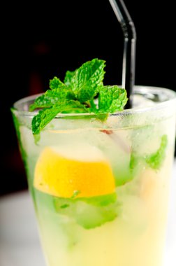 Mojito caipirina cocktail with fresh mint leaves clipart