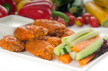 Buffalo chicken wings served with pinzimonio clipart