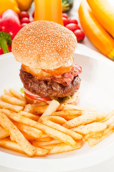 Classic hamburger sandwich and fries — Stock Photo, Image