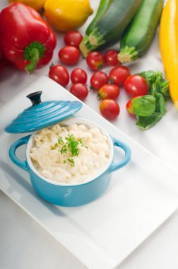 Mac and cheese on a blue little clay pot