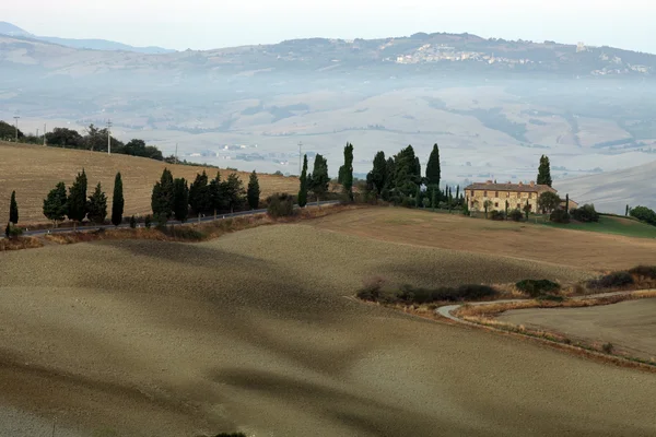 The hills around Pienza and Monticchiello just after sunrise — Stock Photo, Image