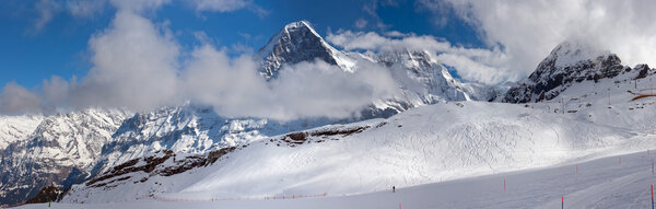 Eiger. Ski slope in the background of Mount Eiger.