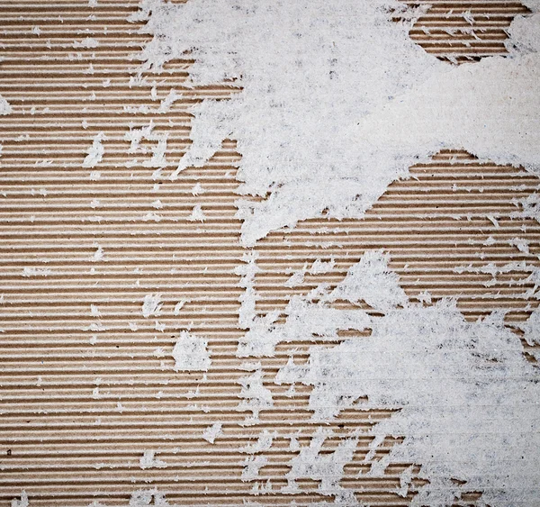 Textured cardboard with torn edges — Stock Photo, Image