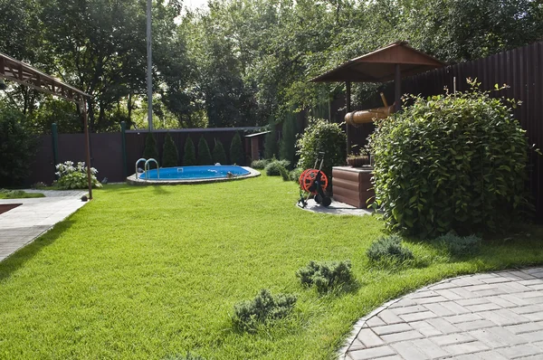 stock image Rural area with a pool.