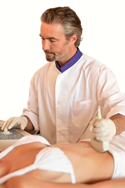 Doctor conducts a procedure for diagnosis apparatus — Stock Photo, Image