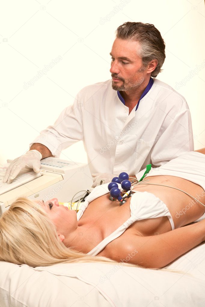 Doctor spends with the patient the procedure body of physiologic