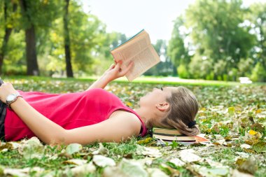 Young woman with book clipart