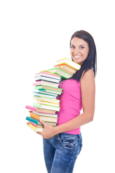 Menina sorridente com pilha de livros nas mãos — Fotografia de Stock