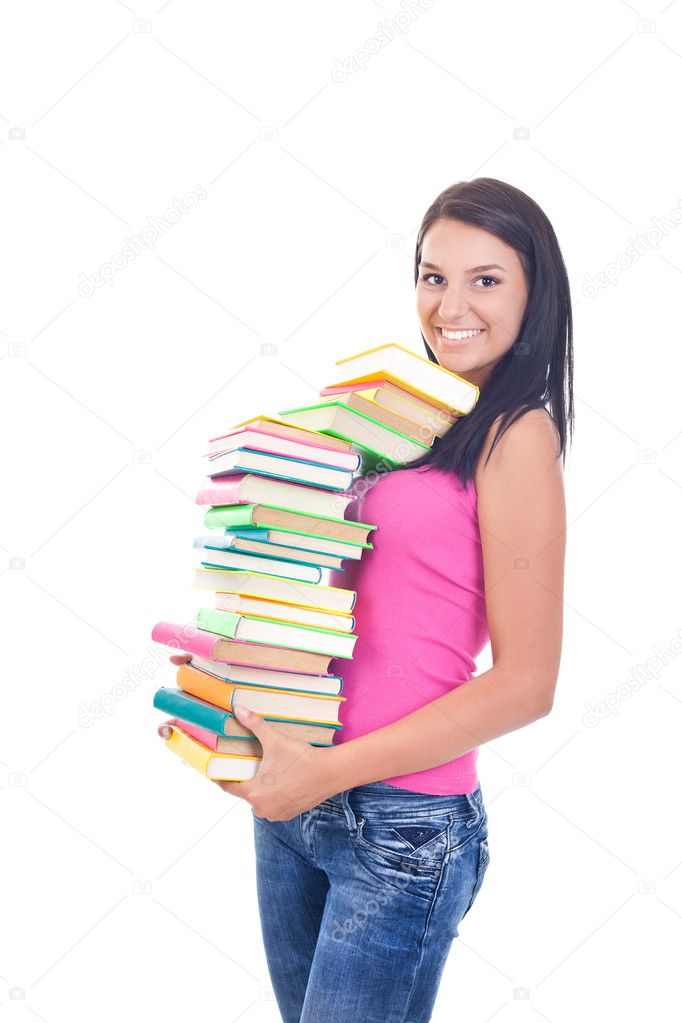 Smiling girl with pile of books in hands