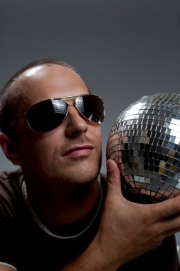 Man with disco ball