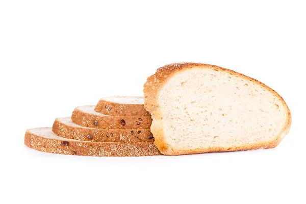 Plátky bílého chleba na bílém pozadí — Stock fotografie