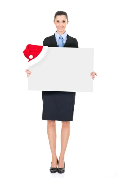 Geschäftsfrau mit Weihnachtsmann-Werbetafel — Stockfoto