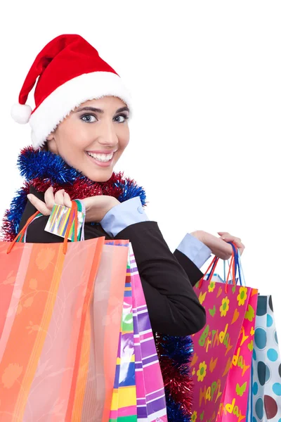 Santa menina com sacos de compras — Fotografia de Stock