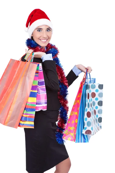 Menina de Natal com sacos de compras — Fotografia de Stock