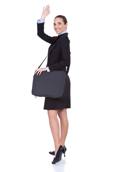 Business woman with suitcase going on trip — Stock Photo, Image