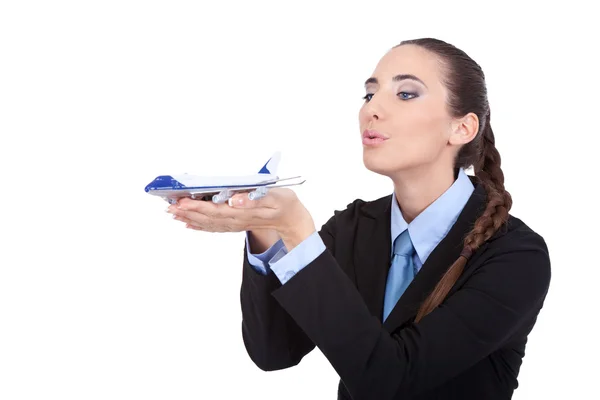 Beauty stewardess with plane in hands — Stock Photo, Image