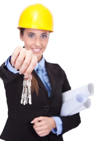 Female engineer with keys — Stock Photo, Image
