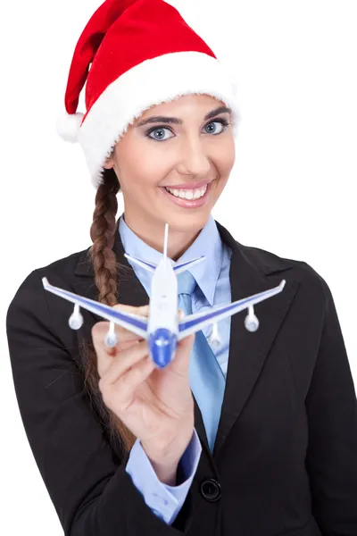 Santa businesswoman holding plane — Stock Photo, Image