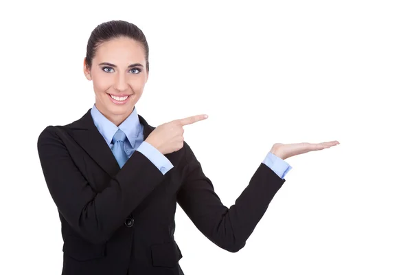 Leende affärskvinna pekar i råvaror — Stockfoto
