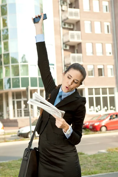 Businesswoman reading excellent news — Stock Photo, Image