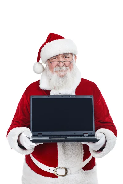 Papai Noel segurando laptop moderno, espaço de cópia, isolado em branco — Fotografia de Stock