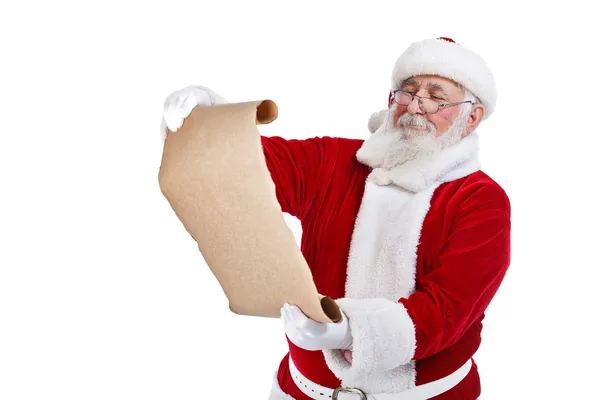Papai Noel com papel de rolagem — Fotografia de Stock