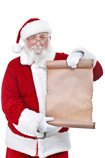 Santa sosteniendo lista de desplazamiento en blanco — Foto de Stock
