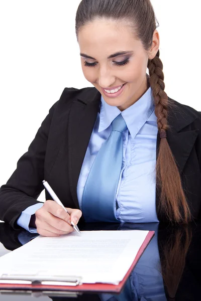 Mulher de negócios assinando um contrato — Fotografia de Stock