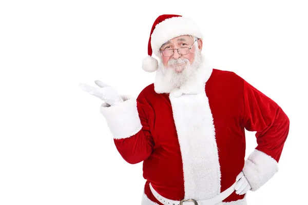 Papai Noel apresentando produto — Fotografia de Stock