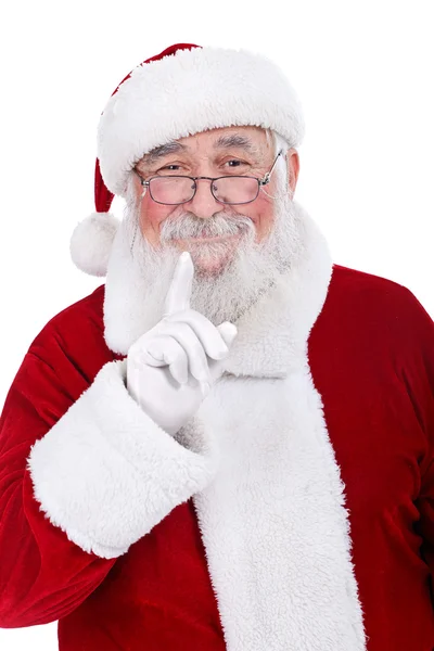 Weihnachtsmann hält sich einen Finger an den Mund — Stockfoto