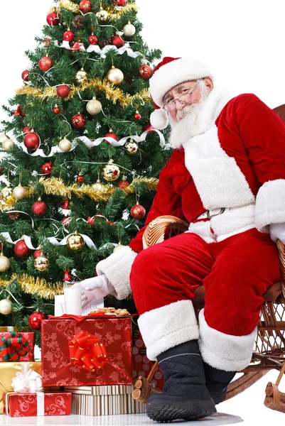 Santa gelet melk en koekjes — Stockfoto