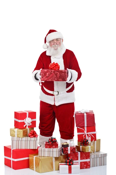 Santa Claus with many presents — Stock Photo, Image