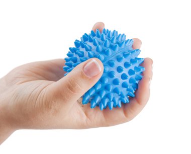 Woman's hand with massage ball clipart