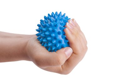 Woman's hand with massage ball clipart