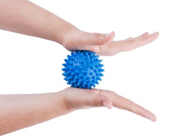 Woman's hands with massage ball clipart