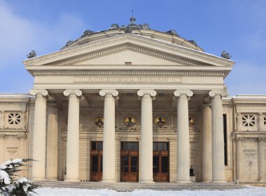 The Romanian Athenaeum in winter clipart