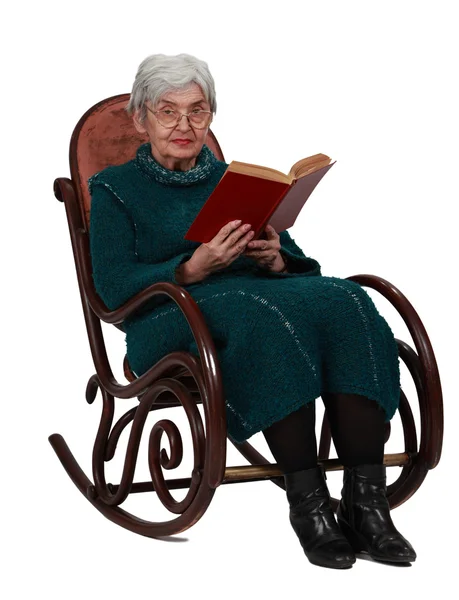 Old woman with a book — Stock Photo, Image