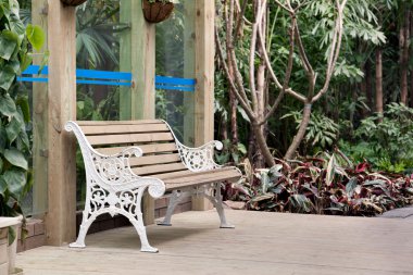 Chair on summer house wooden deck clipart