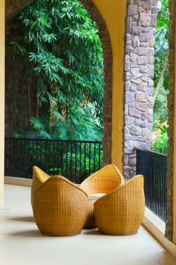 Porch with rattan chairs clipart